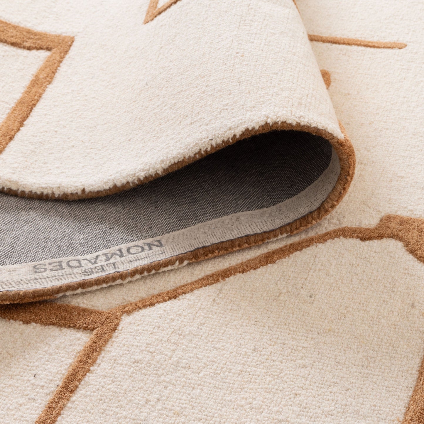 Les Nomades Lines Rust Wool Rug