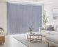 Luxx Shades Plain in Light Grey on a wide living room window