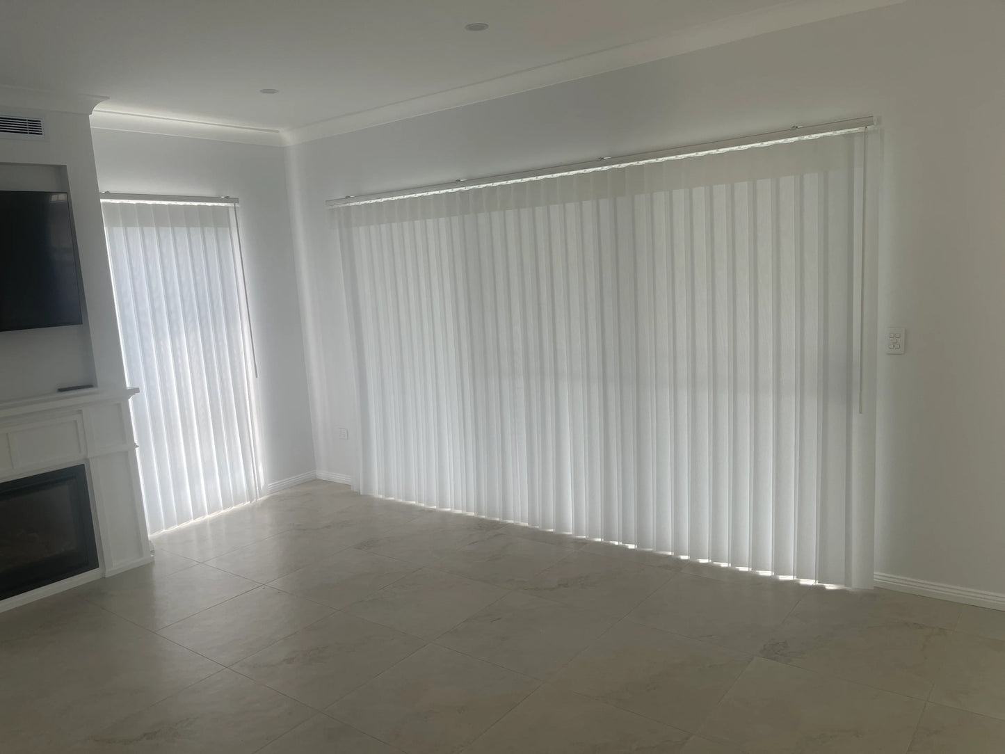 Luxx Shades installed across a wide sliding door in a Sydney living area